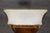 Graceful, refined, and unmistakably French in inspiration, this exceptional Maison Jansen style marble top console table...