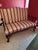 This piece, also known as a Georgian Style Loveseat, is an elegant settee featuring a classic camelback silhouette...