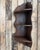 This antique corner shelf in solid oak dates from the late 19th or early 20th century. Designed to hang in a corner, it...