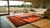 Strikingly Lovely Red Ground Color in a Greek Key Style Antique Chinese Mongolian Rug For Sale - Image 9 of 10