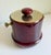 A vintage ice bucket created by the renowned Italian designer Aldo Tura and produced by maker Macabo. Crafted from dyed...