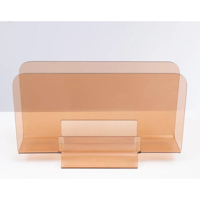 Very nice Space Ace magazine rack in smoked acrylic glass. Good condition.