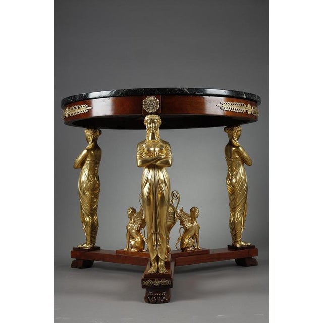 Very handsome Empire-style pedestal table in mahogany and superb ormolu mount after a model by Jacob-Desmalter, the...