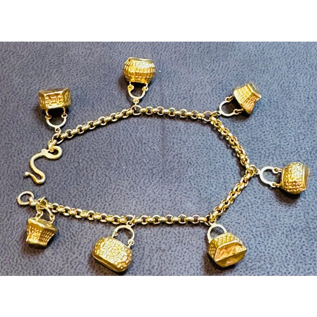 Metal 24 Karat Yellow Pure Gold 15.5 Gm Charm Bracelet with 7 Basket Charms For Sale - Image 7 of 18