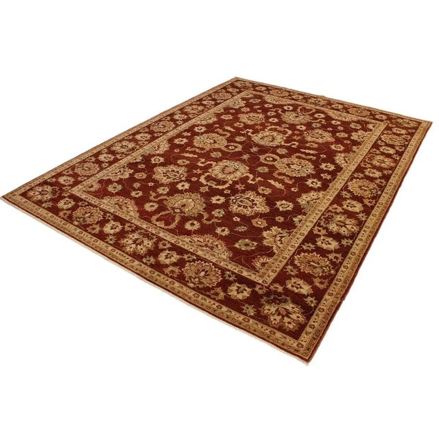 A Persian influenced Turkish hand knotted rug made by skilled artisans capable of creating the most exceptional vegetable...