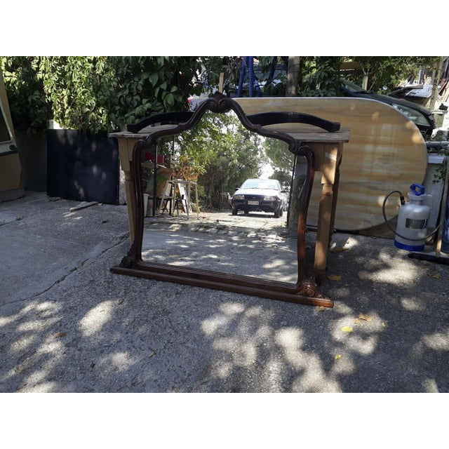 Great carved mirror in solid walnut with shaped mirror Italy era 1890 measures 130 x 5 x h 103 category Mirror antique...