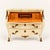 A striking Louis XV-style bombé secretary presented in a soft ivory finish. The curvaceous form is complemented by a...
