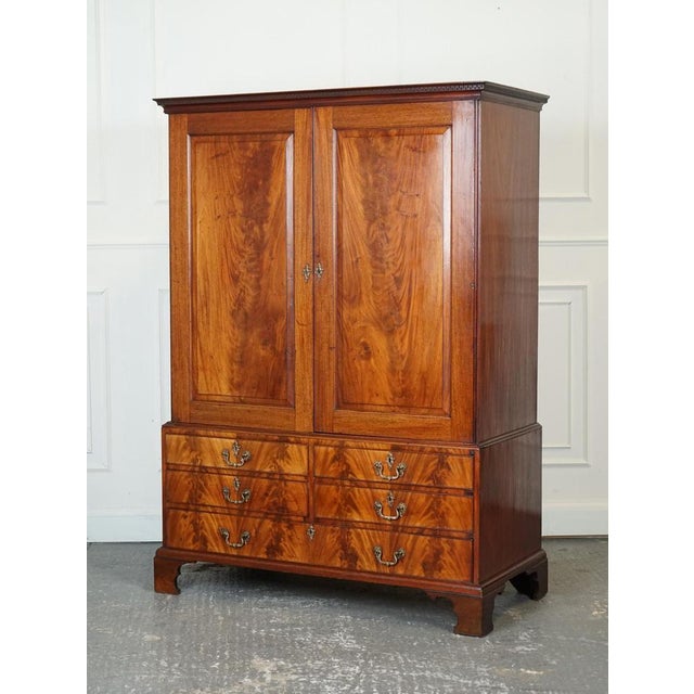 1800 Antique Georgian Linen Press Wardrobe. The 1800 Antique English Georgian Flamed Hardwood Linen Press Wardrobe Armoire...