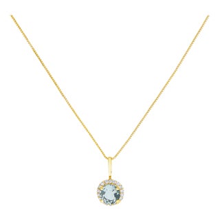 10K Yellow Gold Blue Aquamarine and 1/10 Cttw Diamond Accent Halo Pendant Necklace For Sale