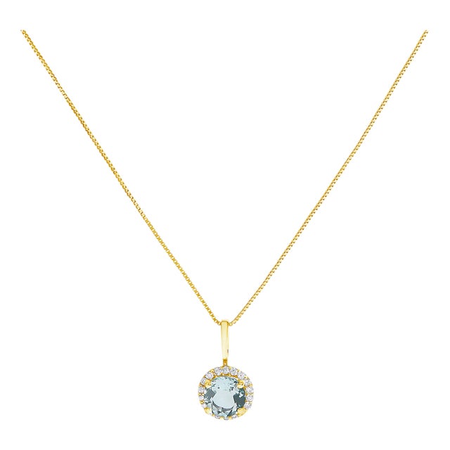 10K Yellow Gold Blue Aquamarine and 1/10 Cttw Diamond Accent Halo Pendant Necklace For Sale