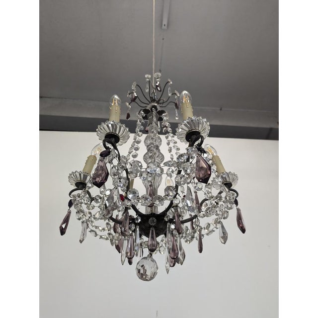 Crystal Chandelier with Bronze Frame and Baluster Stem, in Very Good conditions. Up to 250V (Europe/UK Standard).The...