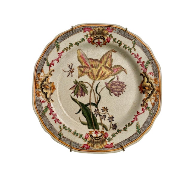 These vintage Chinese ceramic decorative plates have 3 different floral patterns with a heavy crackle glaze. All three...