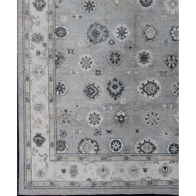Turkish Oushak rug with neutral color palette and all-over flower design, rug , country of origin / type: Turkey / Oushak...