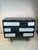 Stunning Black Limed Oak Cabinet With White Abstract Design Front. There are Three Substantial Drawers.Designed In the...