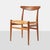 Description Oak & Cane W2 Chairs by Hans Wegner Denmark, c1950s A set of 5 stained oak and cane dining chairs. Each chair...