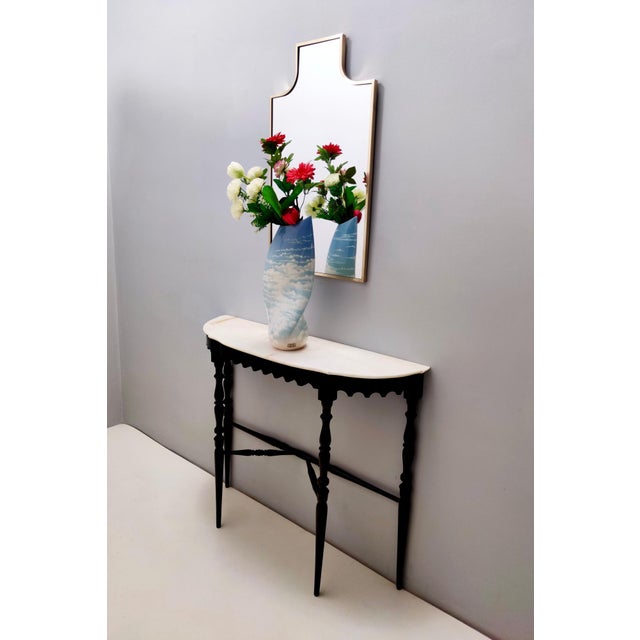 Made in Italy, 1950s. It features a brass frame. It is a vintage piece, therefore it might show slight traces of use, but...