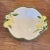 Gorgeous Italian vintage bowl featuring lemons, white daisies and green leaves. In addition to serving bowl, this would be...