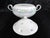 This is a signed Rosenthal Bjorn Wiinblad covered serving dish in Romanze. It is a white floral dish with an overall...