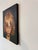 This oil on wood painting captures a moment of introspection, featuring a figure with softly tousled hair, their gaze...