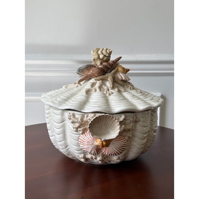 This vintage Fitz and Floyd lidded dish is a stunning piece for anyone who is inspired by the ocean or nature. The...