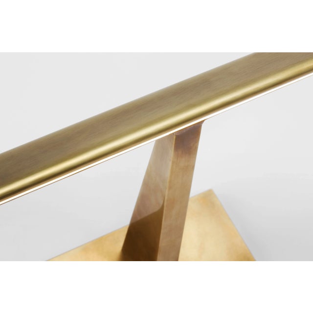 Petrel 24" Picture Light in Hand-Rubbed Antique Brass Designer: Ian K. Fowler Height: 2.5" Extension: 8.25" Backplate:...