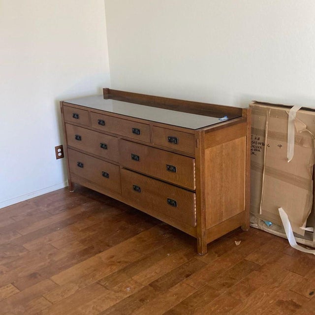 This Stickley dresser is made from quality solid wood and features seven spacious drawers with sturdy metal handles. Its...