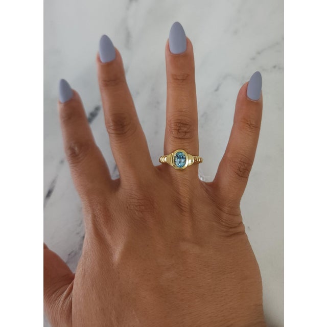 ♥ Product Summary ♥ Main Stone: Blue Topaz Band Material: 14k Yellow Gold Stone Cut: Oval