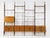 Four-module configuration: 318 × 45 × HT 265 cm, adjustable height to 310 cm max This piece is designed in the style of...