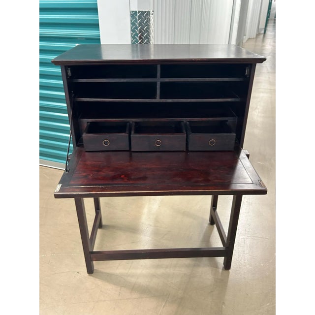 This is one of our most unique finds. This appears to be an Asian wood and brass box on a stand. The box can be removed...