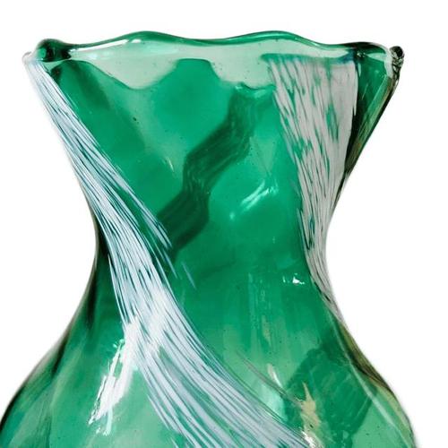 Vintage German mid-century hand-blown vase in green glass with white stripe accents from the 1960s. The vase features the...
