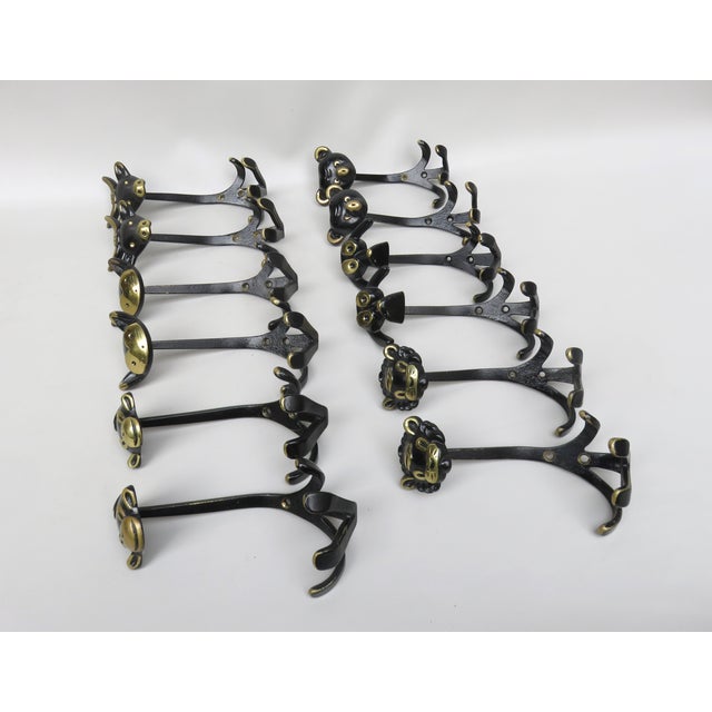 A set of 12 pieces of wardrobe hooks 2 x monkeys, 2 x cat, 2 x cow, 2 x lion, 2 x dog, 2 x bear from the 1950s from Walter...
