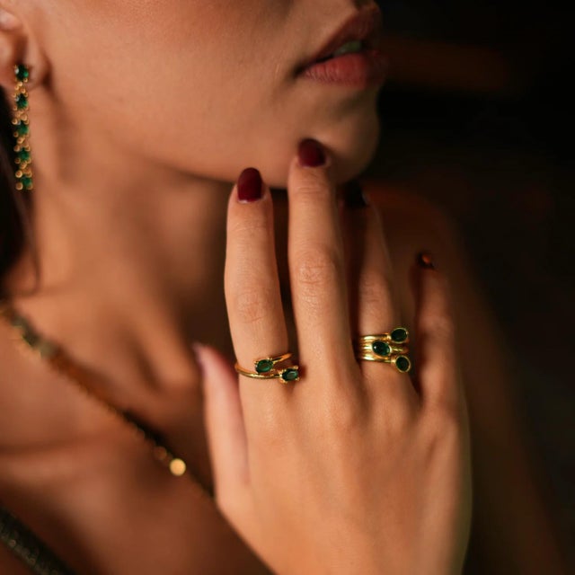 Double Emerald Stone & Gold Dainty Adjustable Ring, designed for both elegance and versatility. Crafted with 24k gold...