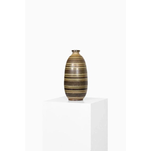 Rare floor vase designed by Arthur Andersson. Produced by Wallåkra in Sweden. This piece is attributed to the mentioned...