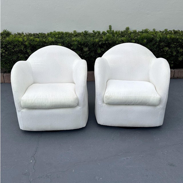 Pair of vintage swivel chairs from the 1980s. Form and function at its best. Comfertable to sit in and great lines....