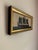 A small but striking seascape in silhouette, this piece captures timeless simplicity and contrast. The ship’s form,...