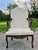 Exquisitely carved solid wood chair upholstered in a tonal cream fabric. Elegant cabriole legs with carvings , carved...