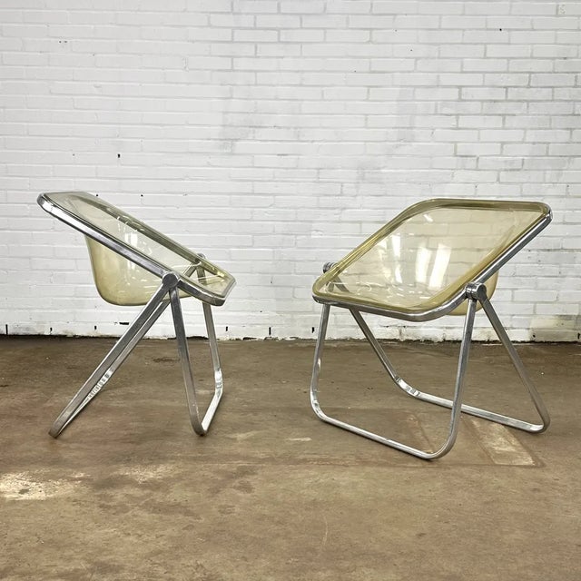 Plona Chairs by Giancarlo Piretti for Castelli, in Good conditions. Designed 1970 to 1979 This piece has an attribution...