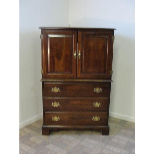 A Stickley cherry media cabinet. Nice shape tight and sturdy..has some lite scratches and wear..numbers on the back reads...