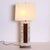 A Modernist rectangular table lamp Marble with walnut details. H:35 Shade W:15 shade D:13 inches.