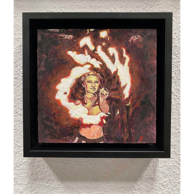 In "Vera Fire Dancer," a figure elegantly twirls flames, capturing a moment of intense energy and movement. The rich, warm...