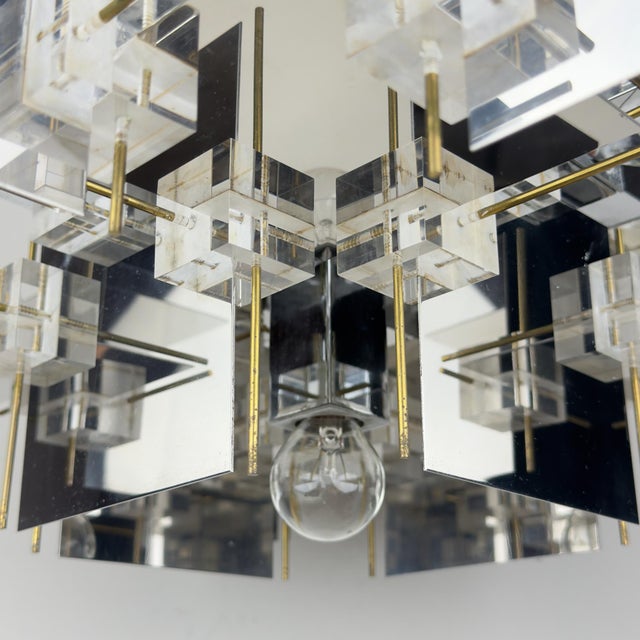 Large vintage geometric chandelier by gaetano sciolari made in italy in the 1950s. the sciolari brand was founded in rome...