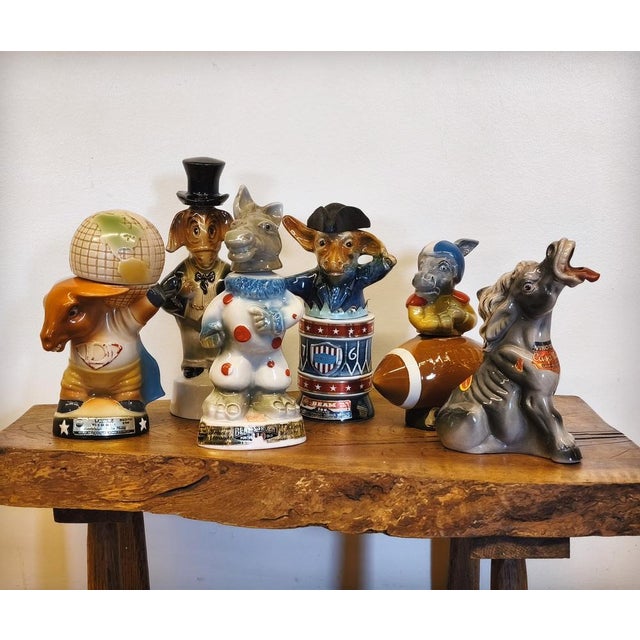 A ceramic decanter or bottle depicting a superhero donkey carrying the world like Atlas, produced and published by bourbon...