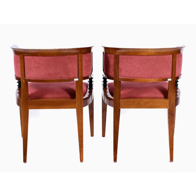 Solid cherry wood, upholstered with garnet velvet, washable. This piece has an attribution mark, I am sure that it is...