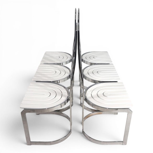 This exceptional set of six Allmilmö design chairs is a striking testament to the experimental design language of the late...