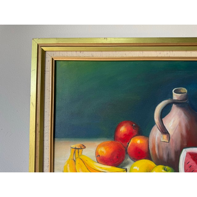 A vibrant and skillfully rendered still life, this 1990’s oil on canvas by Dominican artist Arquímedes showcases a rich...