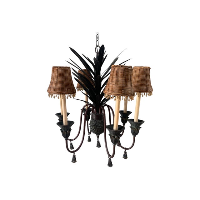 Add a touch of vintage charm to your living space with this sculptural tole metal chandelier. With six arms designed in...