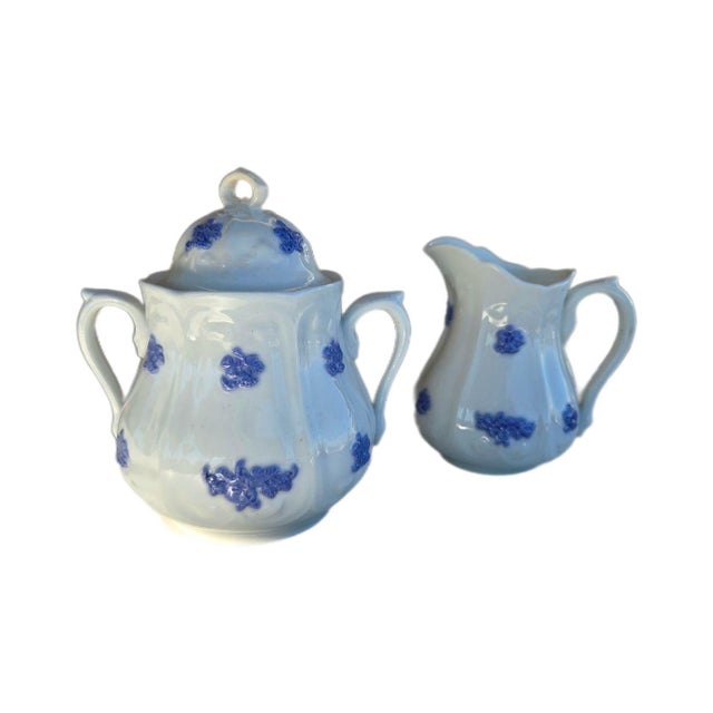 This is a stunning 75-piece antique Adderley England “Chelsea Blue” bone china set, featuring the iconic raised grapes...