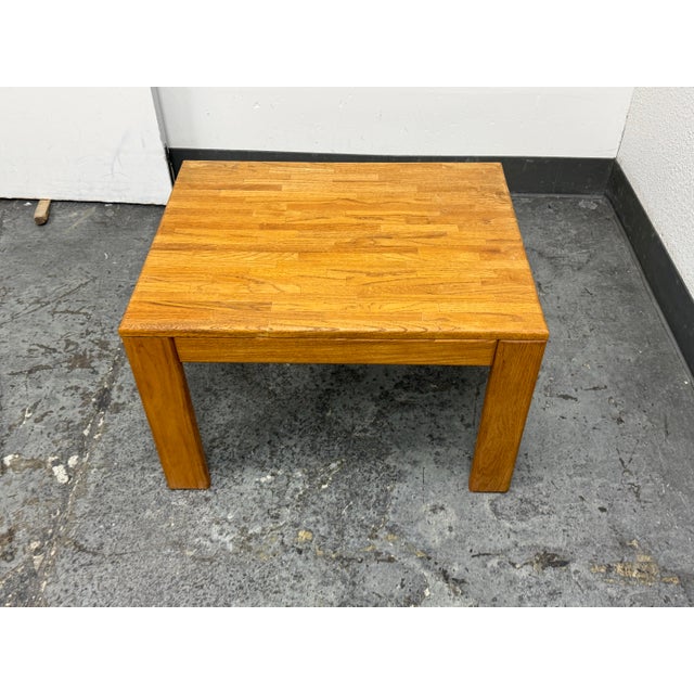 Design Plus Gallery presents a Vintage Oak Butcher Block Side Table. The square tabletop is composed of numerous oak...