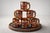 Striking set of six mid-century amber glass bar mugs featuring iconic Western motifs. Each mug is fitted with sculptural...