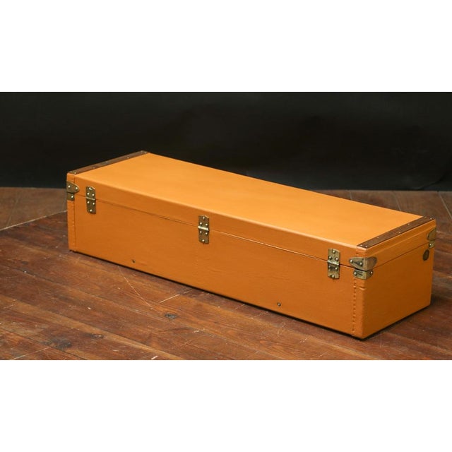 Orange Trunk from Brand Moynat, in Very Good conditions. Designed 1890 to 1919 This piece has an attribution mark, I am...